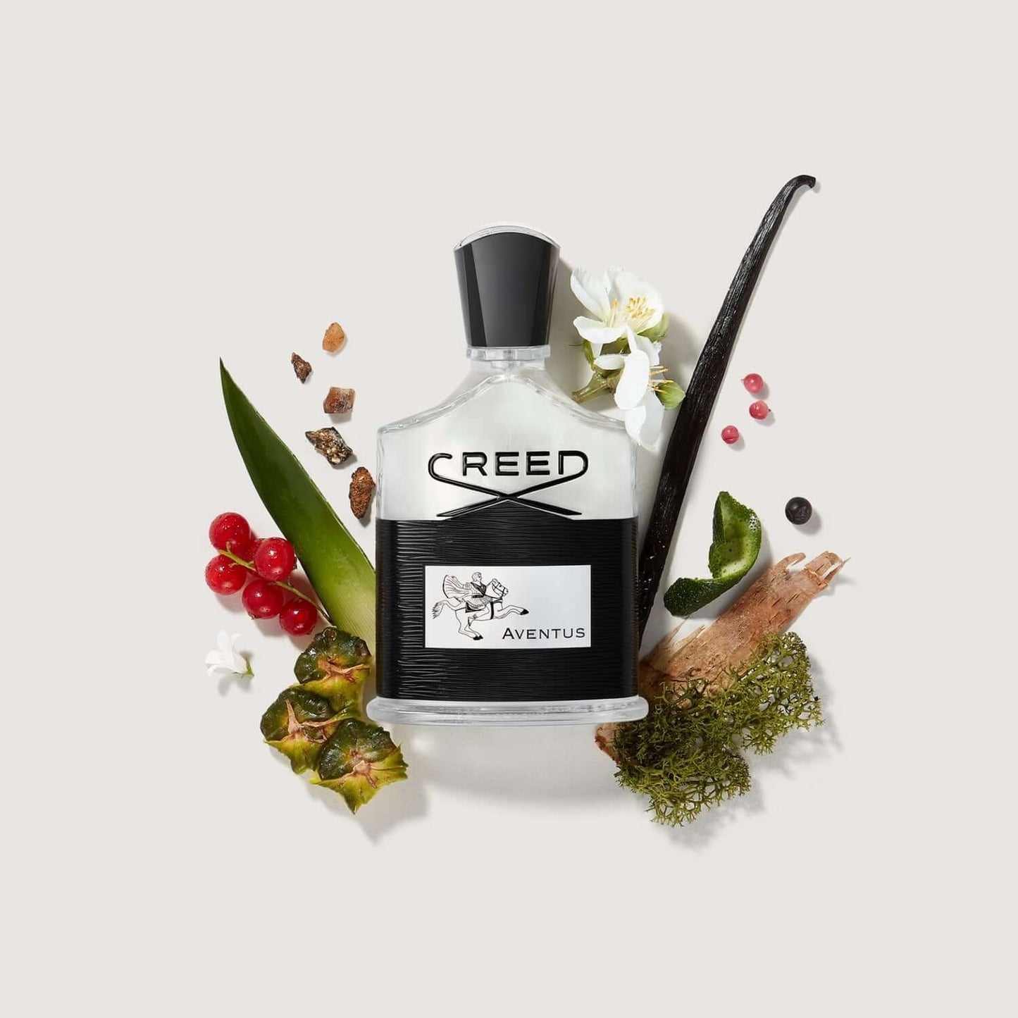 CREED AVENTUS Eau de Parfum bottle with pineapple and blackcurrant highlighting fresh and luxurious scent notes