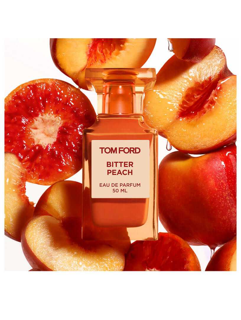 TOM FORD BITTER PEACH perfume bottle with peach and floral elements showcasing sweet and bitter fragrance notes